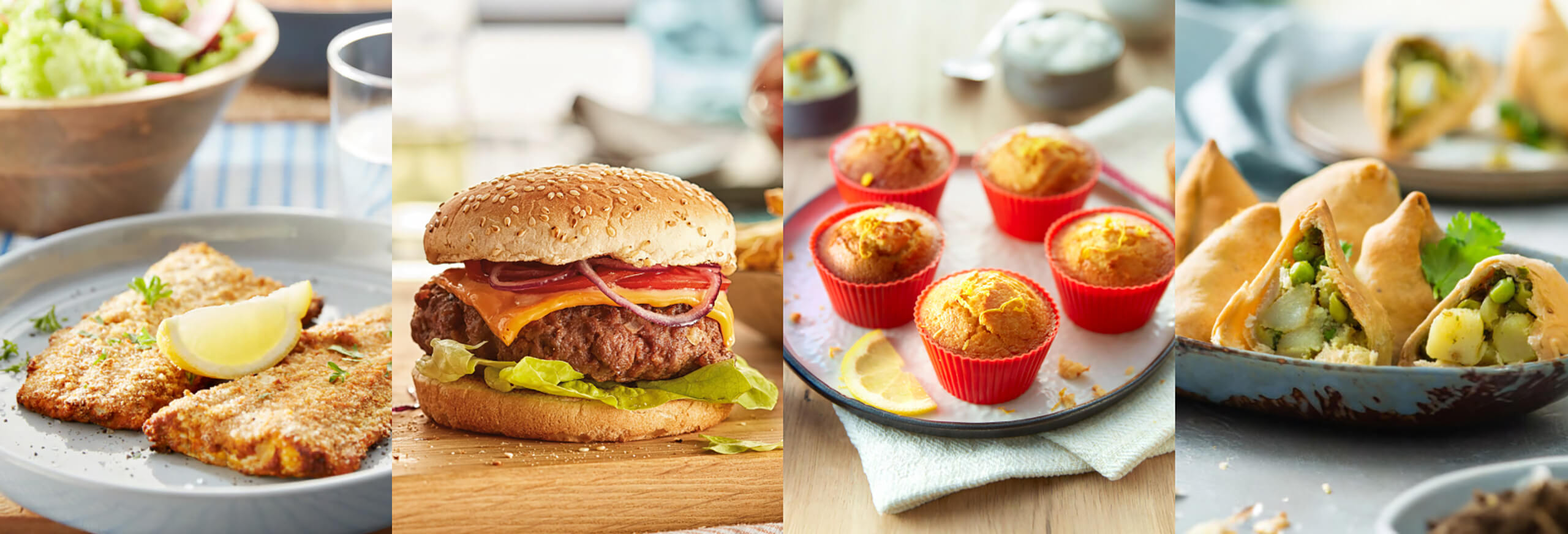 Čtyři různ&eacute; chutn&eacute; pokrmy připraven&eacute; ve frit&eacute;ze Philips se dvěma ko&scaron;&iacute;ky