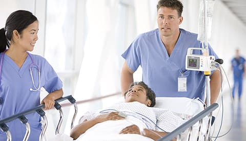 A patient is being wheeled in. Workflow adjustmenst can help in reducing the risk of HAI